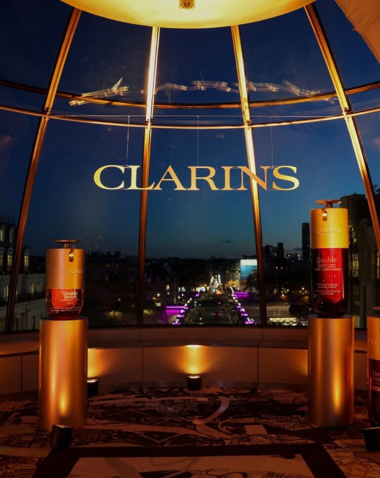 Clarins Double Serum display overlooking Paris at the brand's Fashion Week dinner