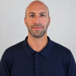 Portrait of Clément Smadja wearing a navy polo shirt.