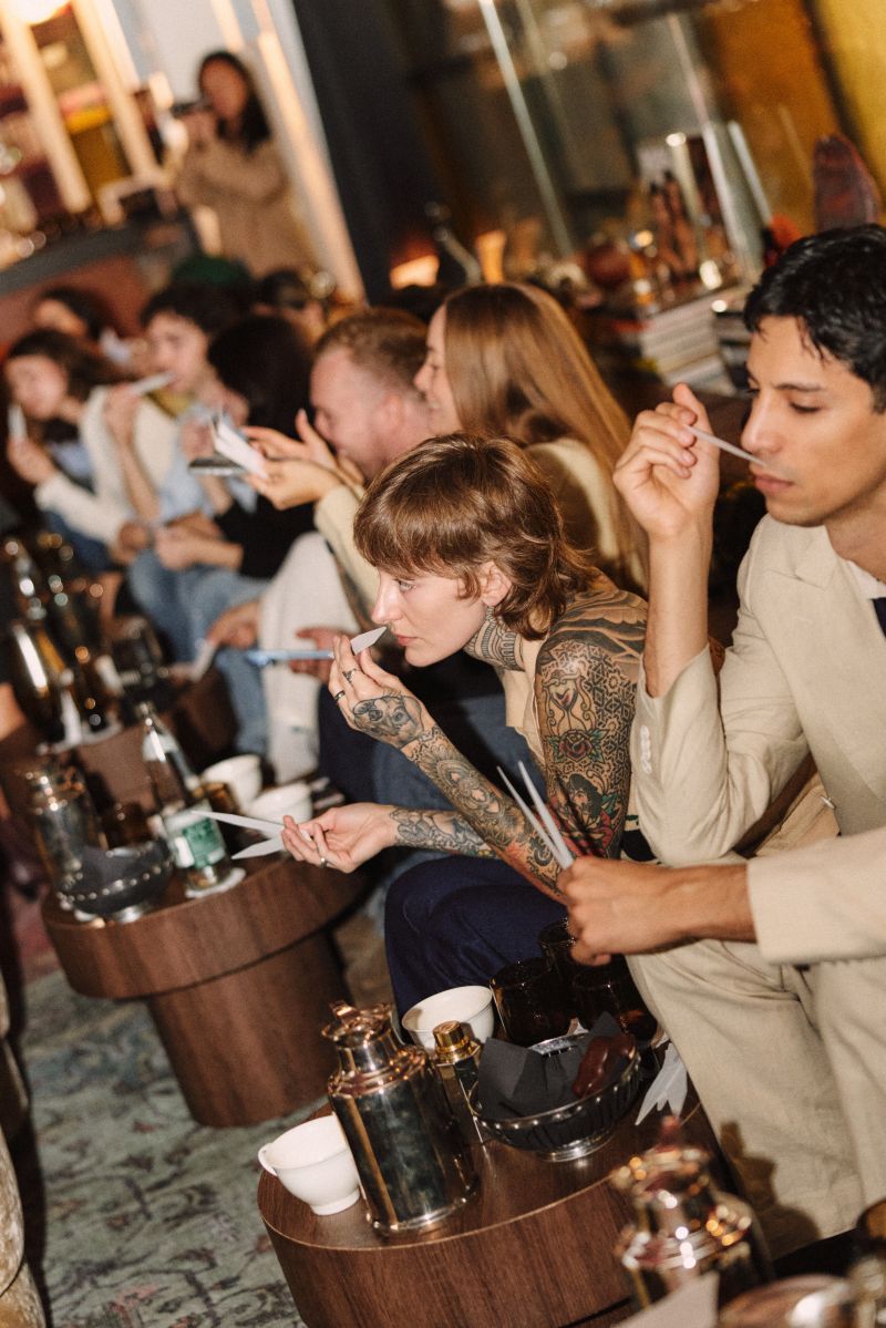 Participants exploring fragrances at Coty’s launch