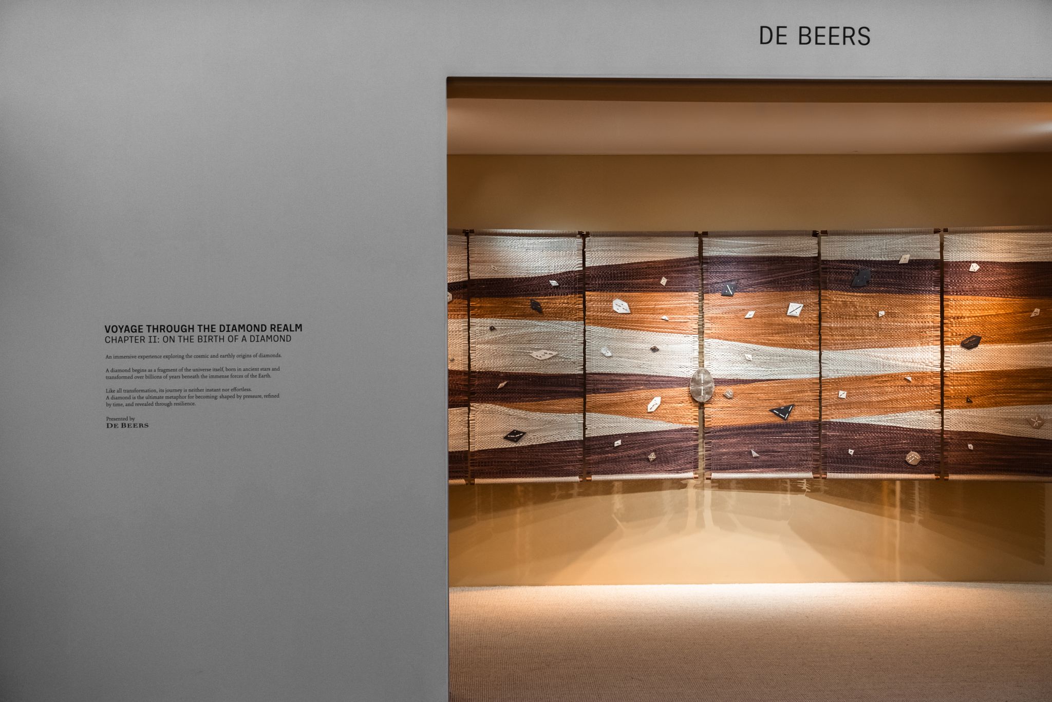 Entrance and illuminated displays in De Beers’ On the Birth of a Diamond installation