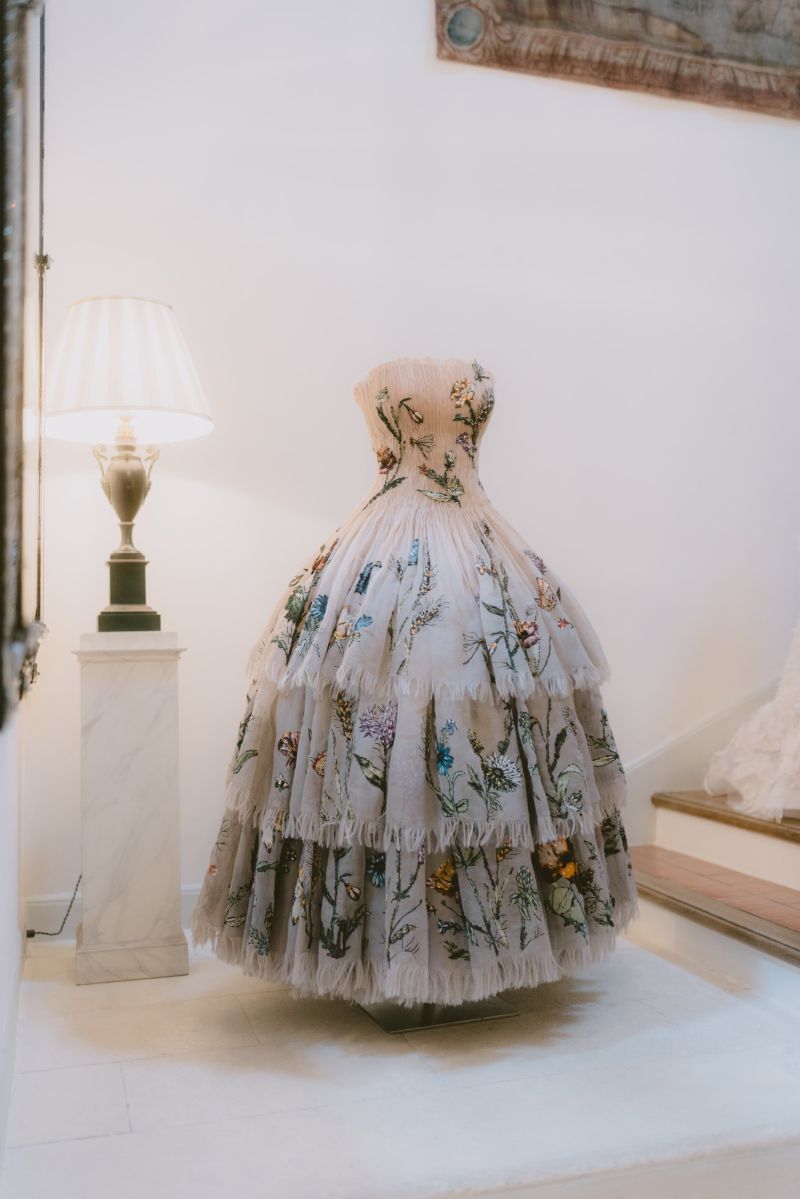 Floral couture dress displayed inside Château de La Colle Noire