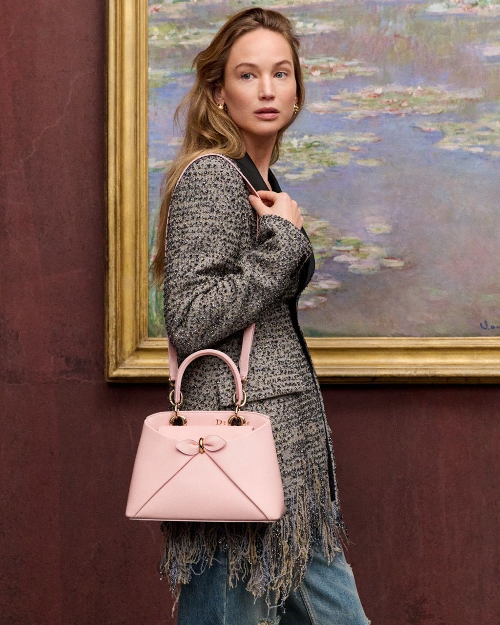 Jennifer Lawrence with a pink Dior handbag at LACMA