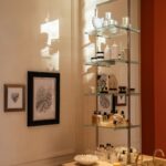 Glass product shelving inside Diptyque’s Düsseldorf boutique