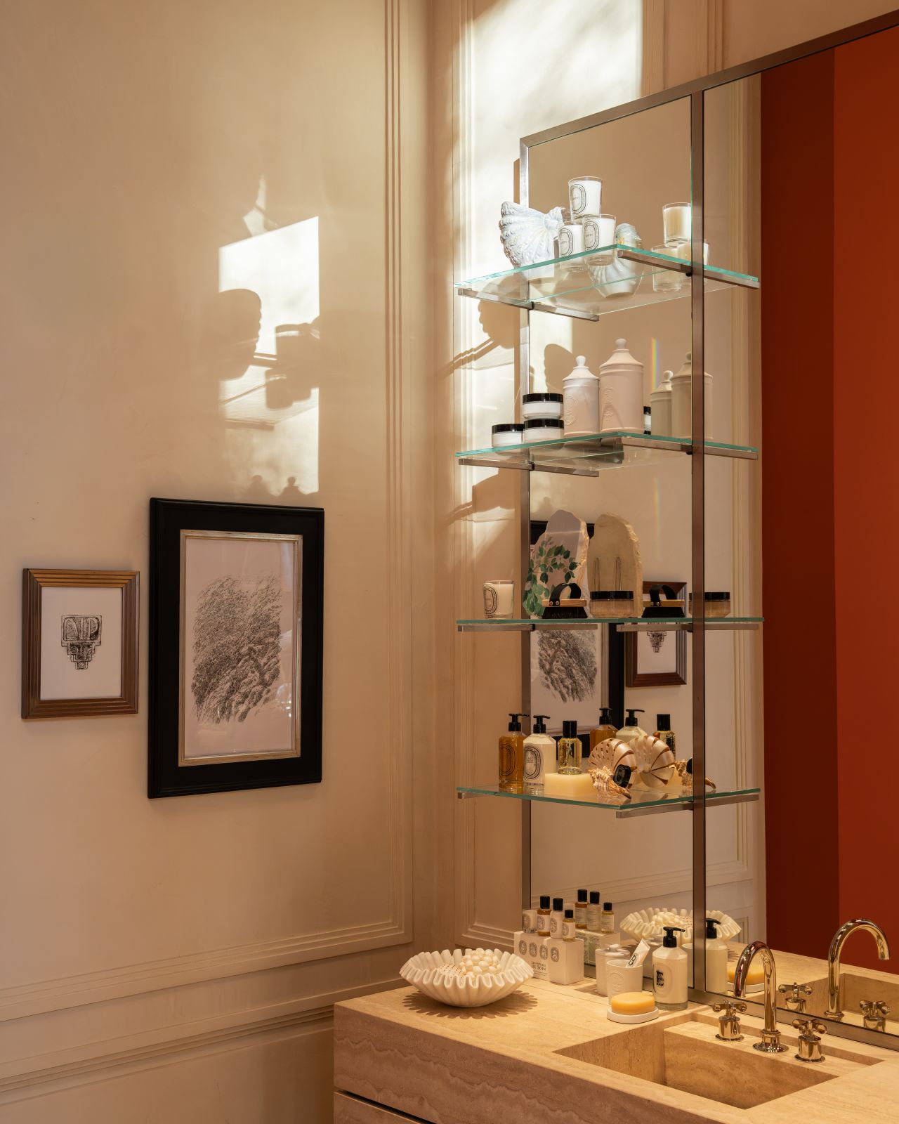 Glass product shelving inside Diptyque’s Düsseldorf boutique
