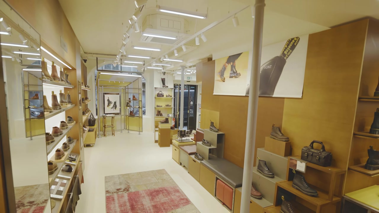 Dr. Martens Le Marais Brand Centre interior with footwear displays and seating