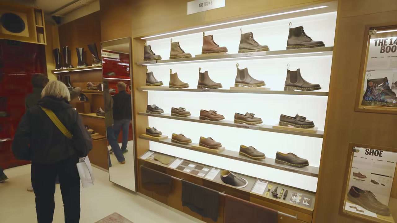 Illuminated footwear wall in the Dr. Martens Le Marais Brand Centre