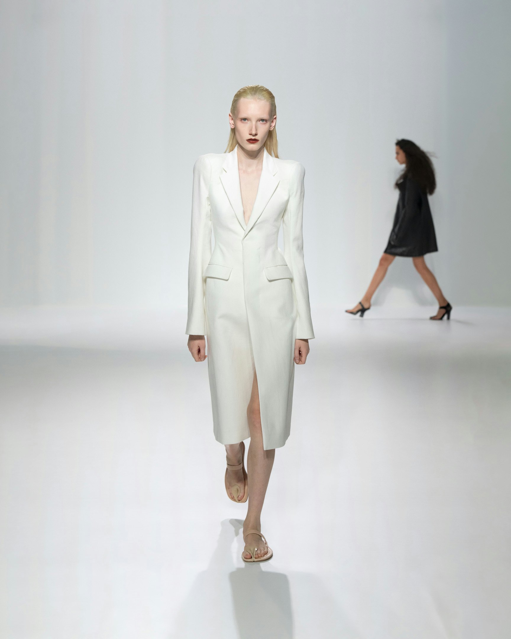 White lapelled coat on the Jean Paul Gaultier runway