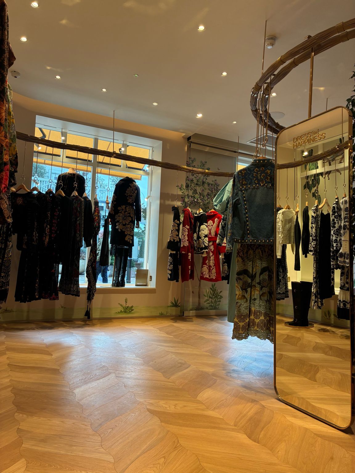 Clothing rails inside FARM Rio Bicester Village