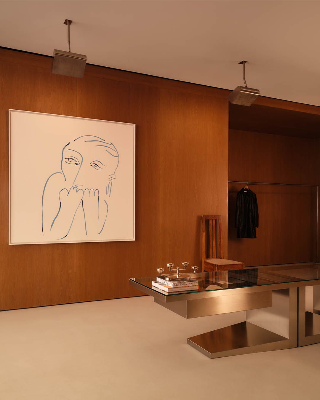 Artwork and display furniture inside the redesigned FRAME SoHo flagship