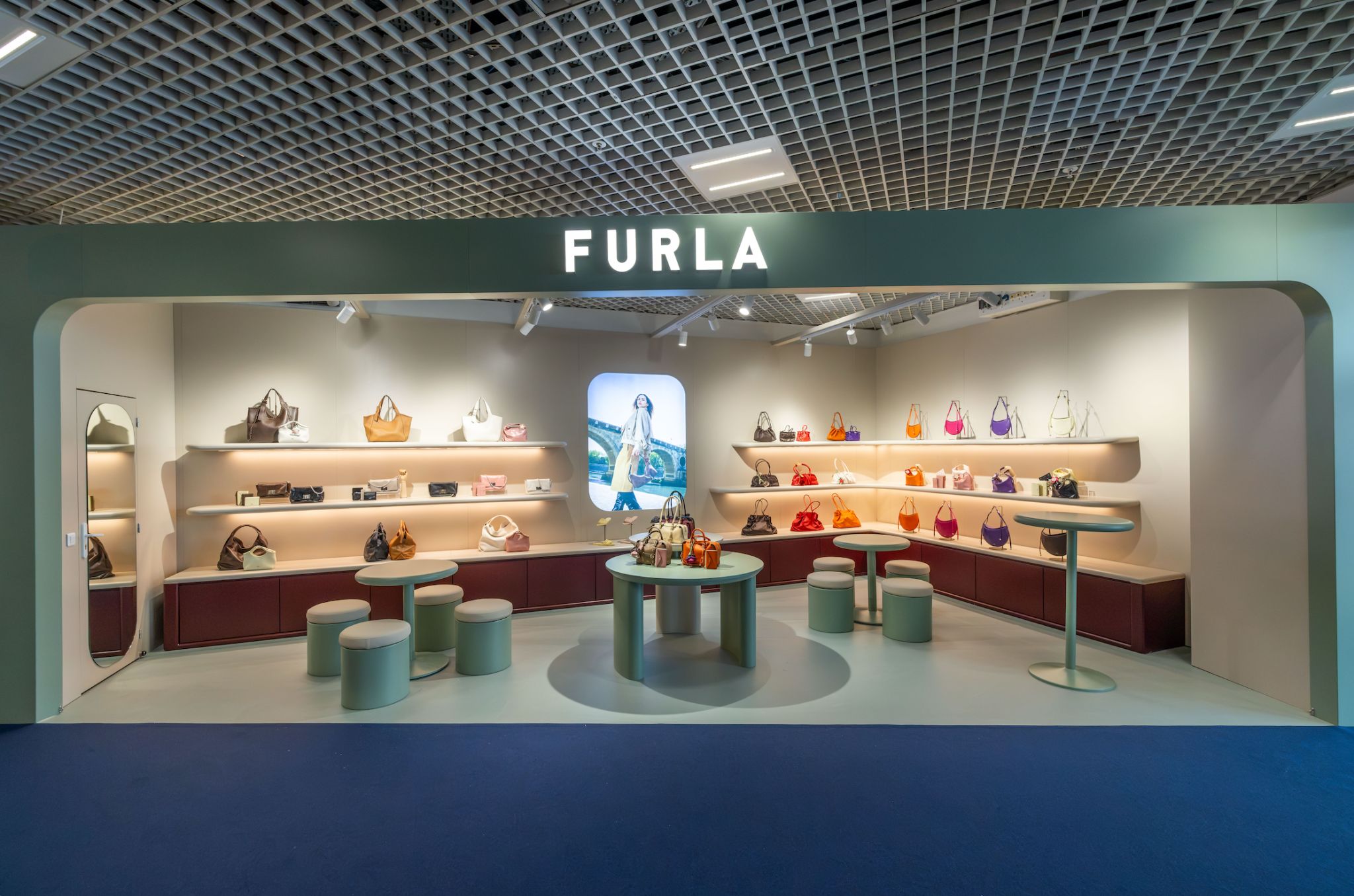 Wide view of Furla’s handbag assortment at its TFWA 2026 Cannes stand