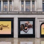 Exterior of a GANNI store with co-branded lululemon collaboration window graphics