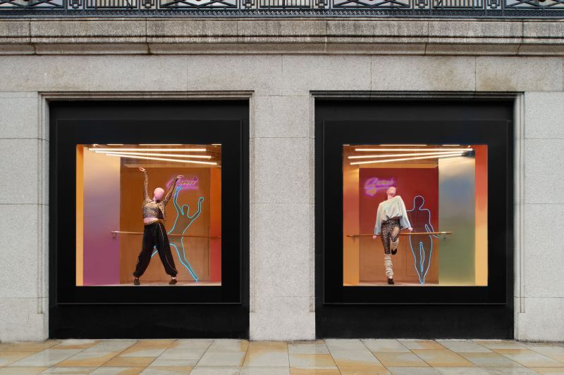 GANNI x lululemon window installation with two mannequins in dance poses
