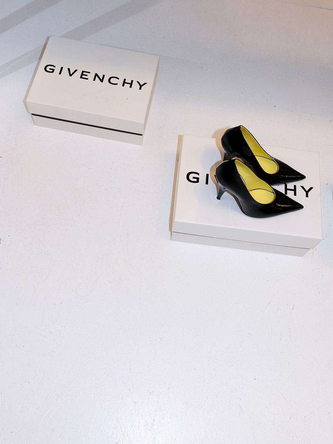 Givenchy Summer 2027 black heels with contrasting yellow insoles