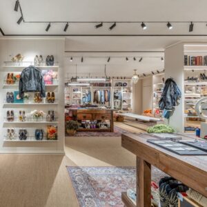 Golden Goose Sydney store with mirrored displays and product shelving