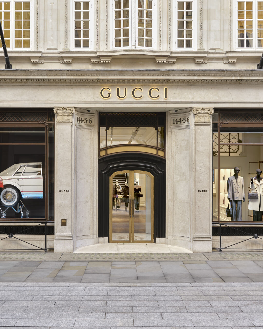 Gucci flagship entrance framed by Primavera window displays