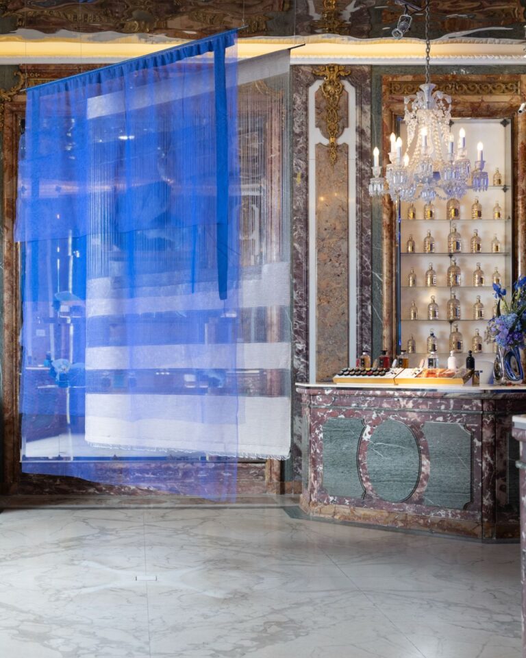 Blue artwork displayed inside Maison Guerlain