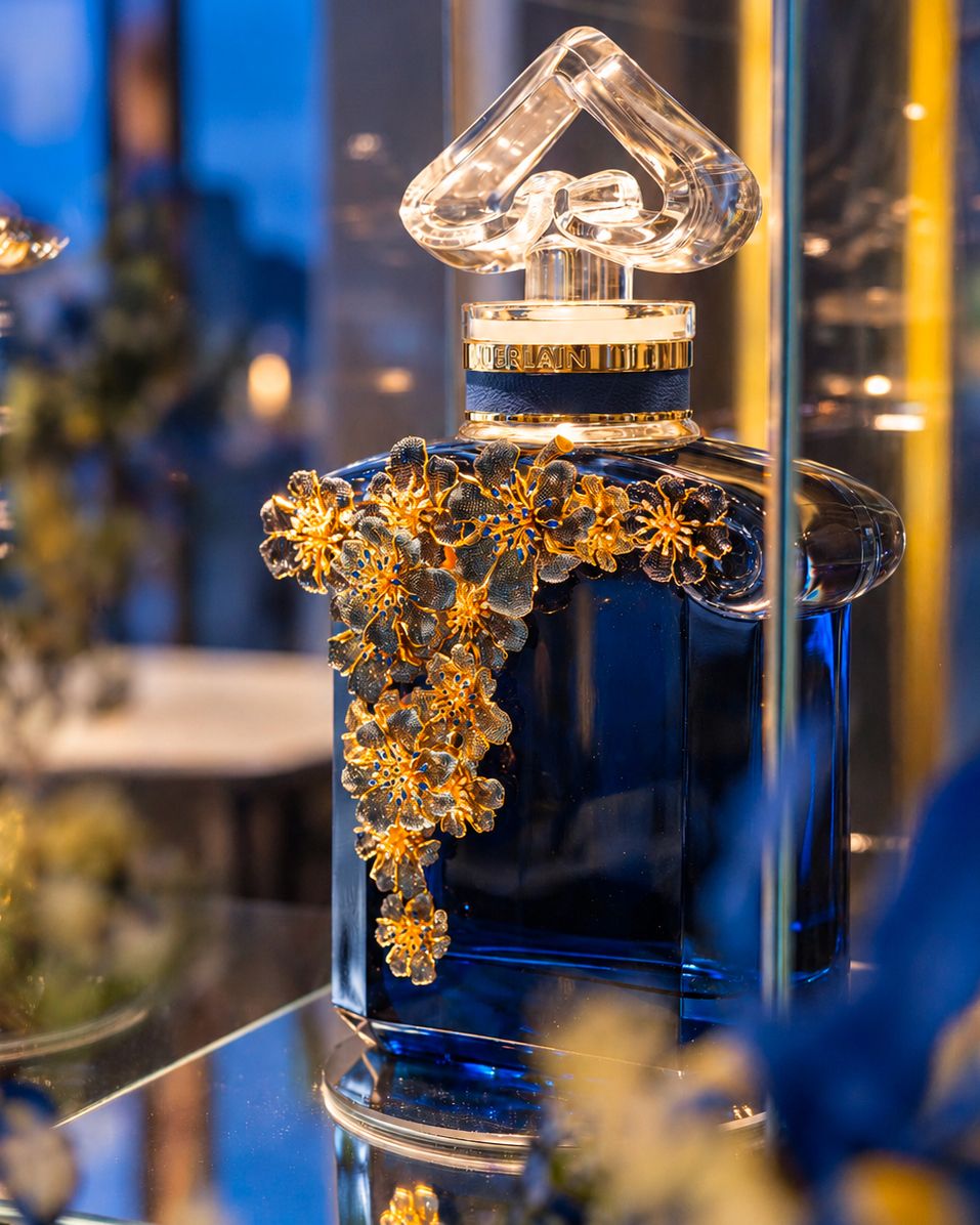 Detail of the Guerlain L’Heure Bleue collector bottle display
