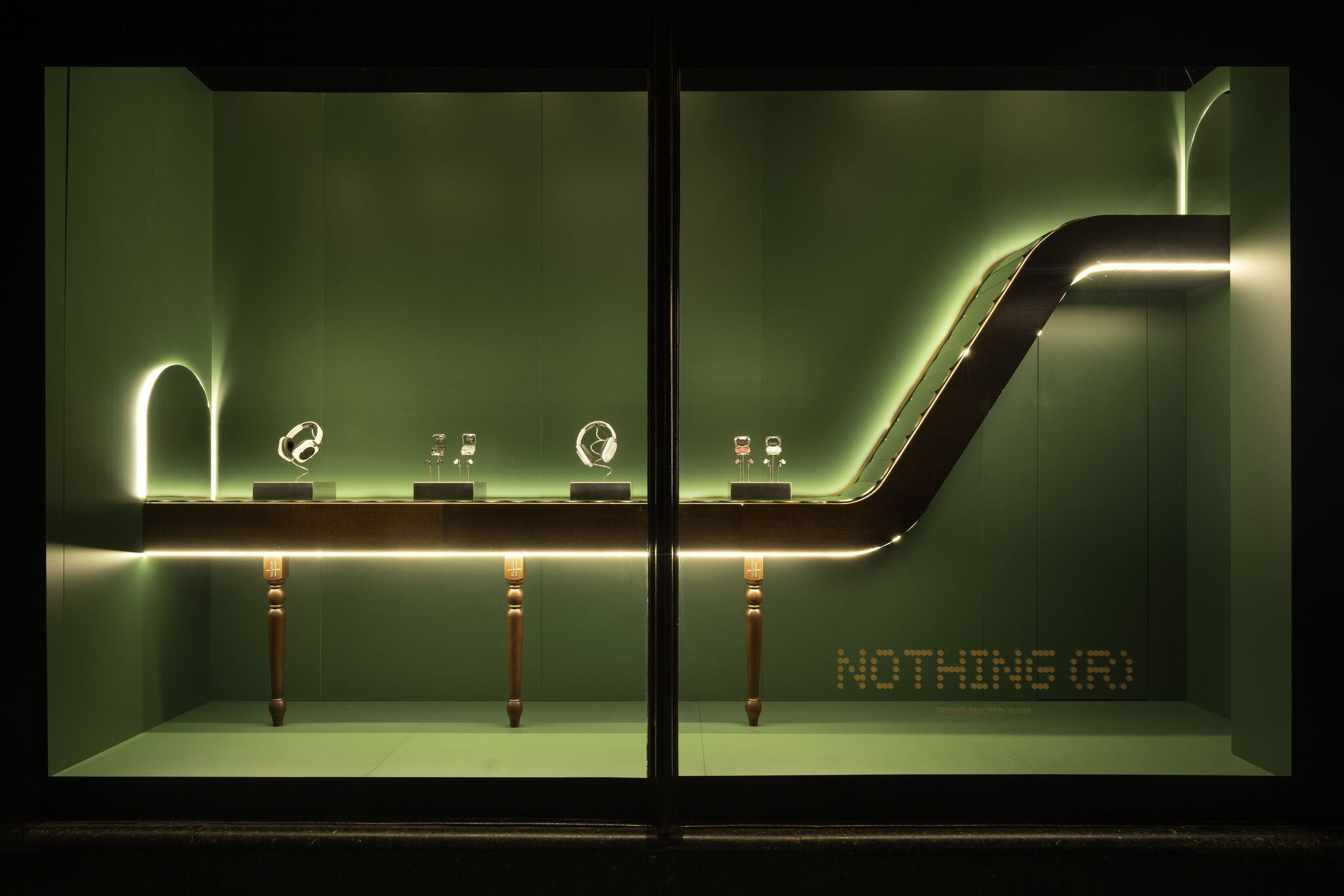Harrods Technology Month green window display with walnut-finished conveyor ribbon, photograph 2