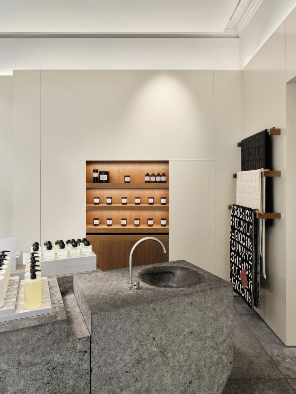 Raw-stone counter and basin in the Byredo Leeds store