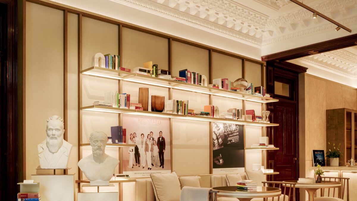 Library and seating area beneath restored decorative ceilings at Casa Cucinelli Shanghai.