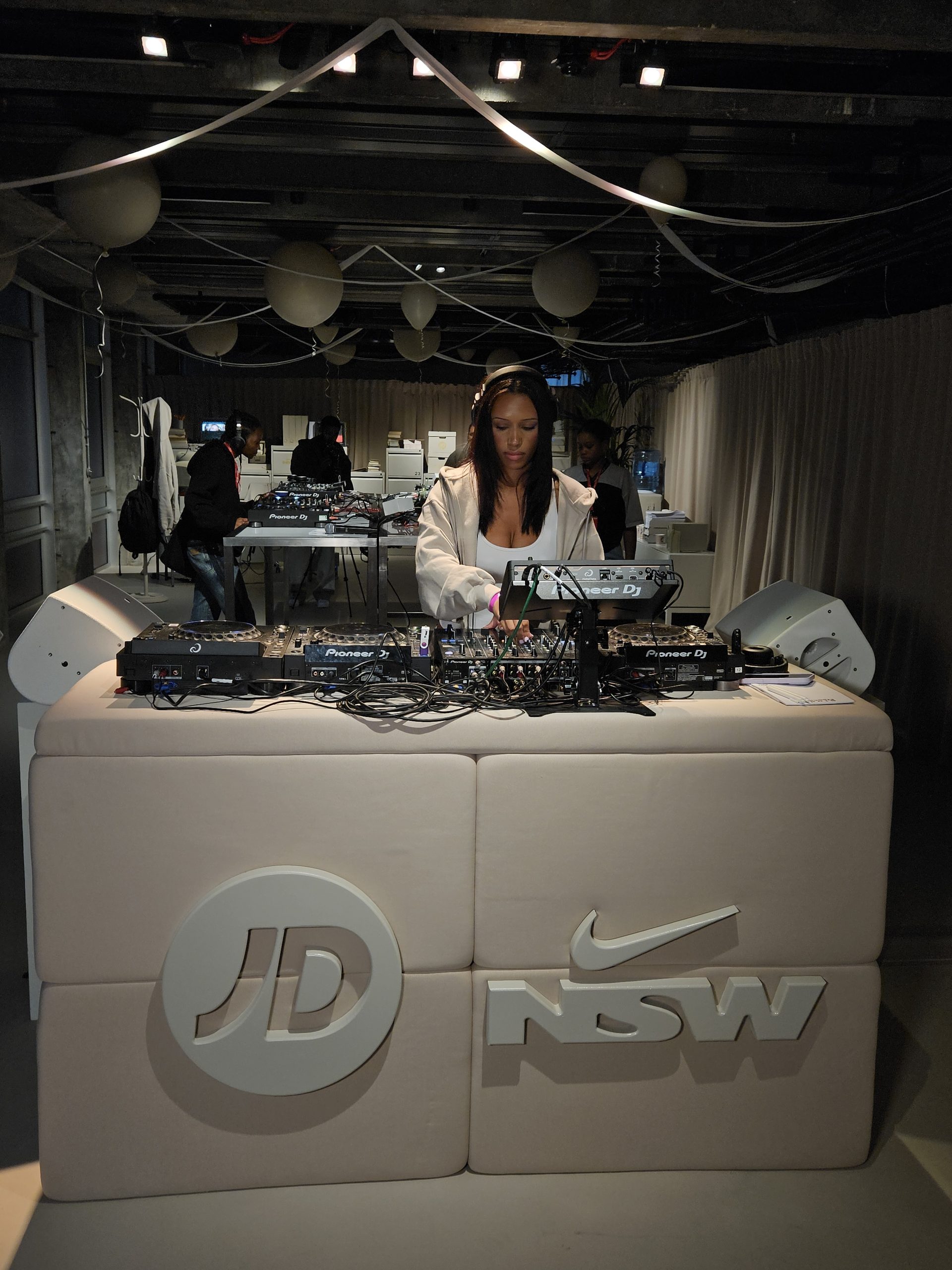 DJ booth at the JD and Nike Studio Fleece activation