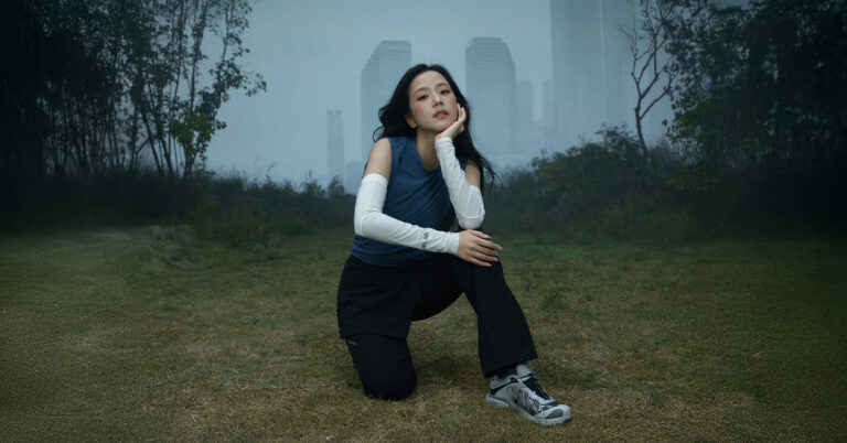 JISOO in Salomon's IN THE OPEN campaign in a misty Seoul landscape