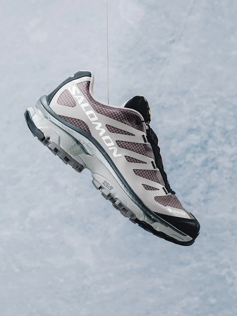 Salomon weather-ready trail shoe photographed against a pale sky