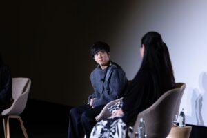 A participant seated during the Women In Motion discussion