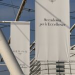 Kering Accademia per le Eccellenze banners at the academic-year opening