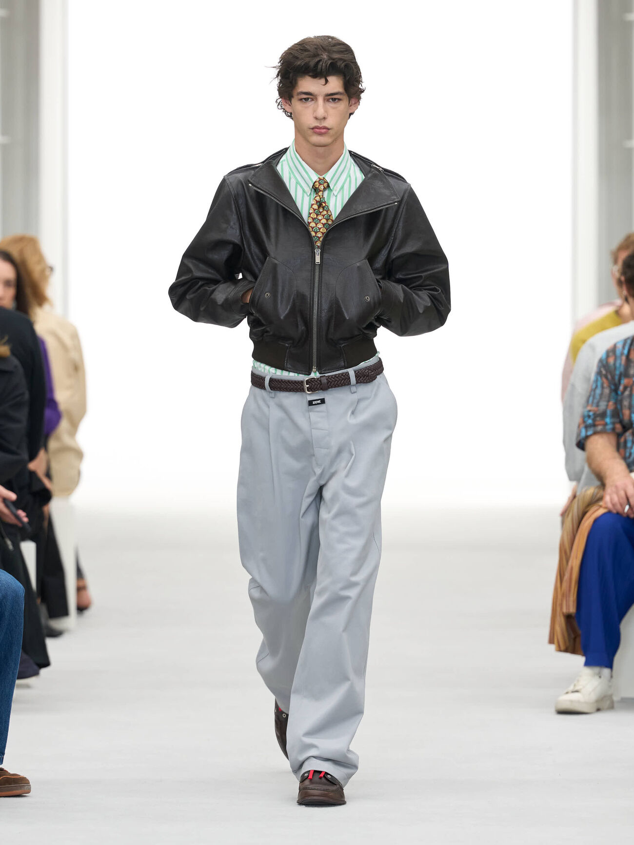 LOEWE Spring/Summer 2027 runway look 3 with a leather jacket and tailored trousers