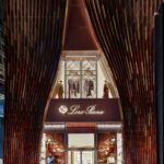 Loro Piana Omotesando flagship entrance framed by curved terracotta tiles