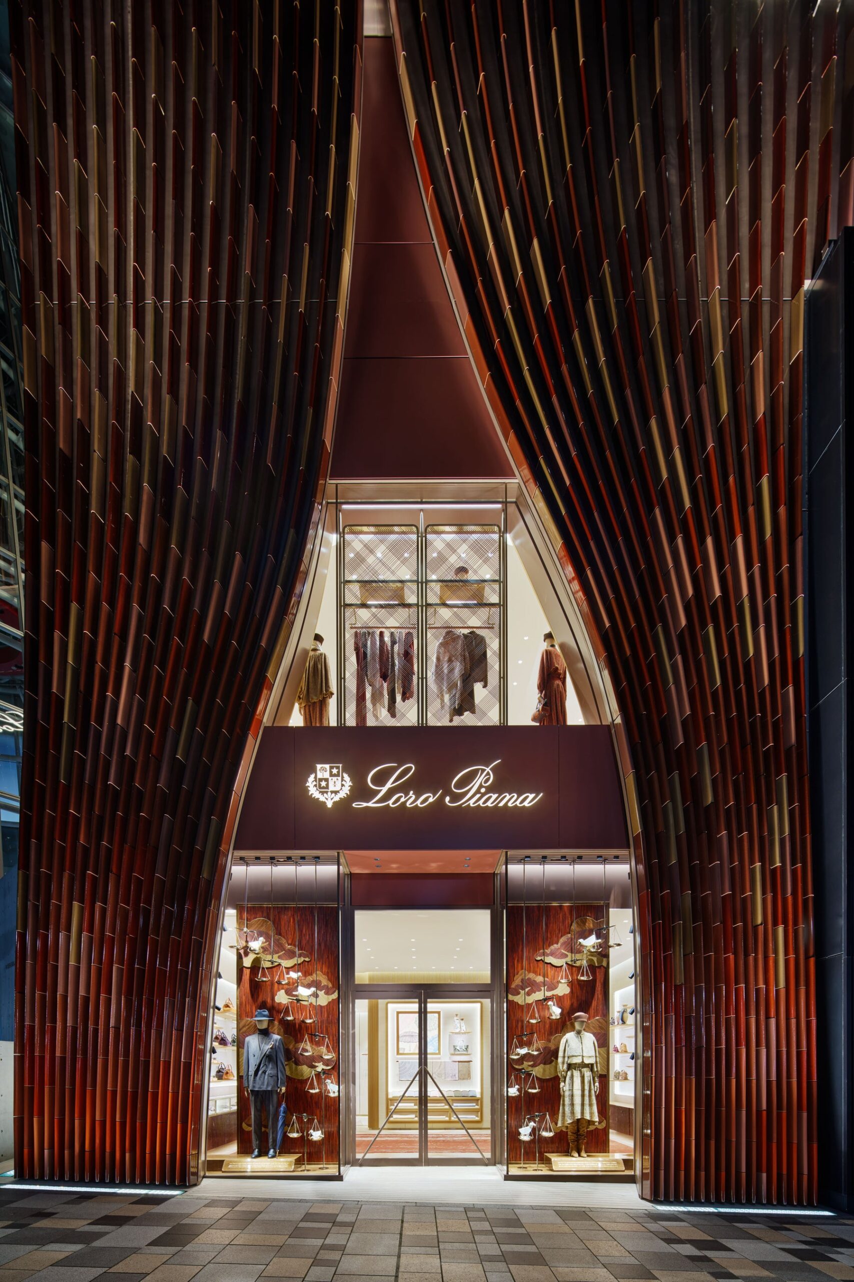 Loro Piana Omotesando flagship entrance framed by curved terracotta tiles