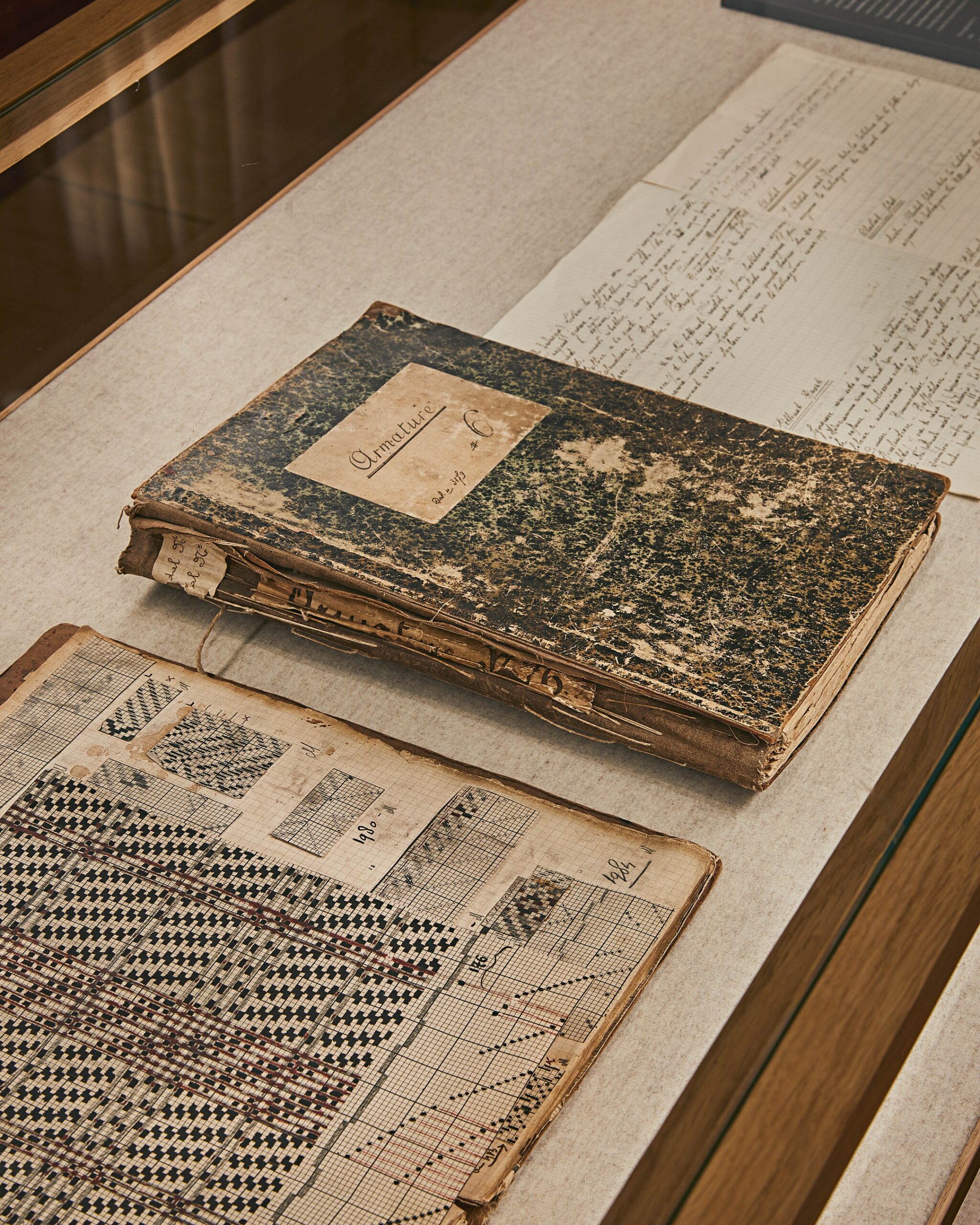 Archive textile books displayed at Loro Piana Omotesando