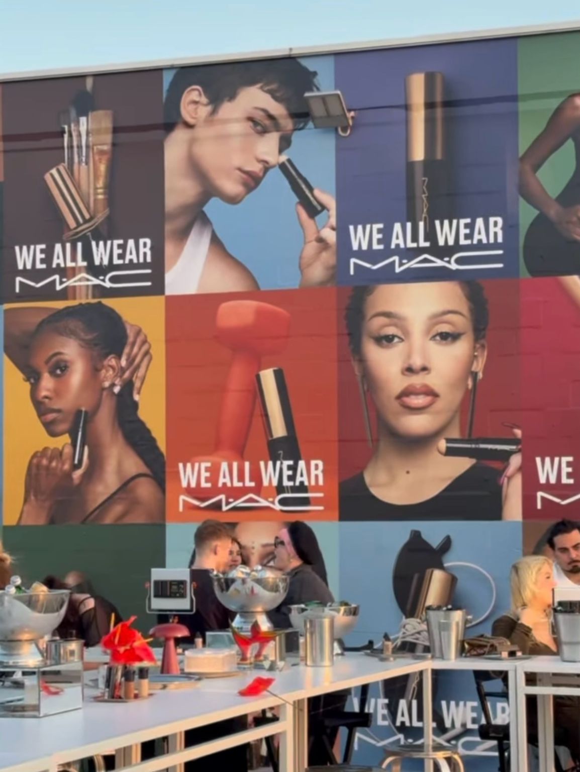 We All Wear MAC campaign imagery displayed at the Sydney launch