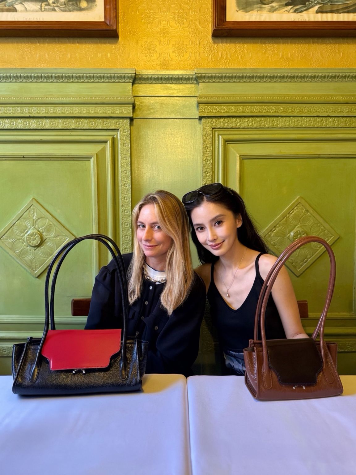 Angelababy photographed with another guest during the Marni SS27 event