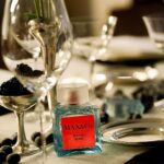 MAX&Co. Sea You Again fragrance bottle on the event table