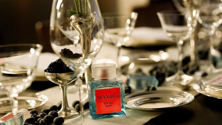 MAX&Co. Sea You Again fragrance bottle on the event table