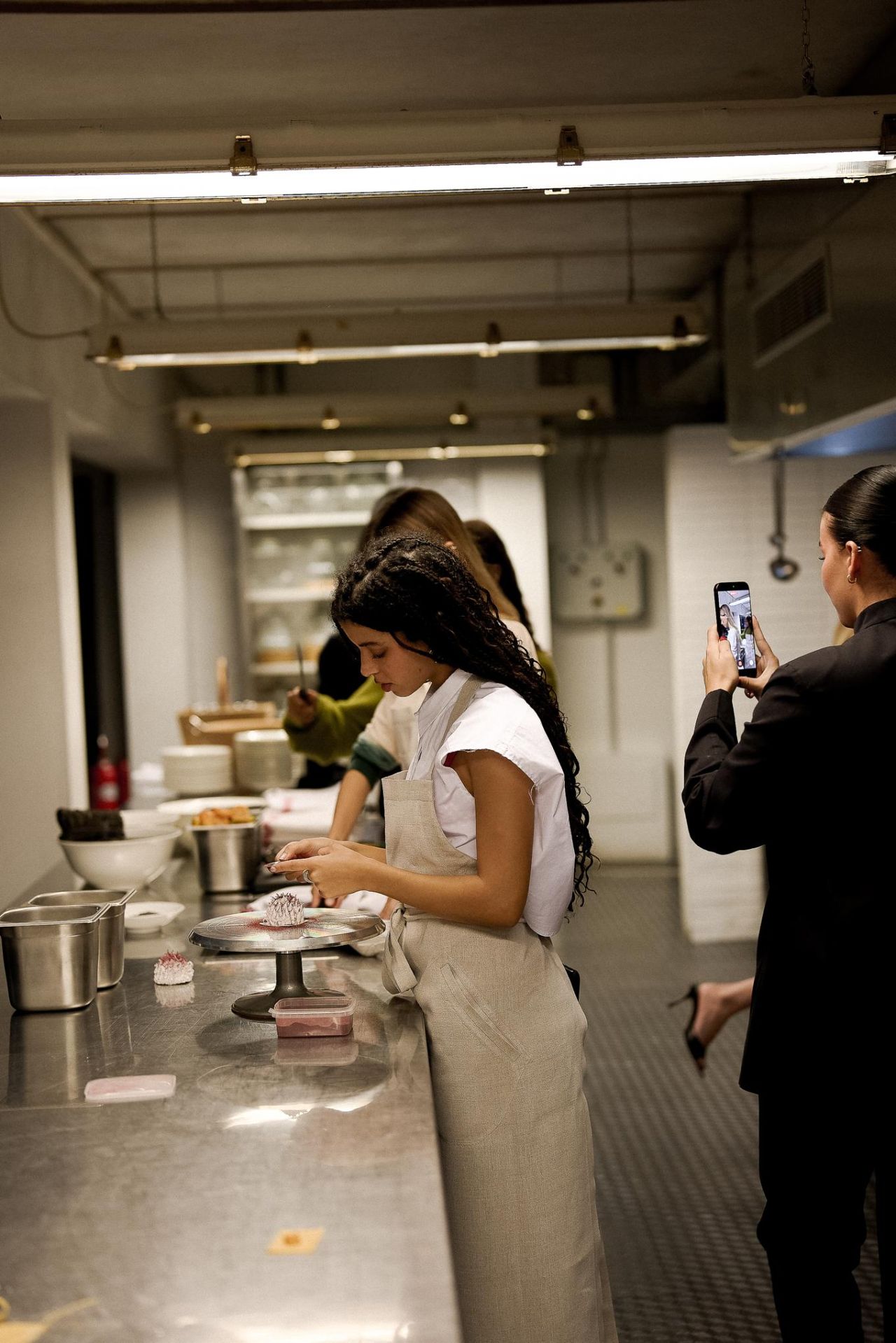 Guests preparing dishes at Mariencò