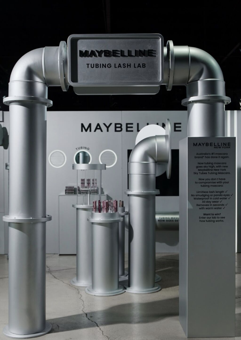 Maybelline Tubing Lash Lab with oversized silver pipework and mascara displays at CW Brand Lab
