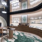 Curved product displays and patterned floor at Montblanc Milan
