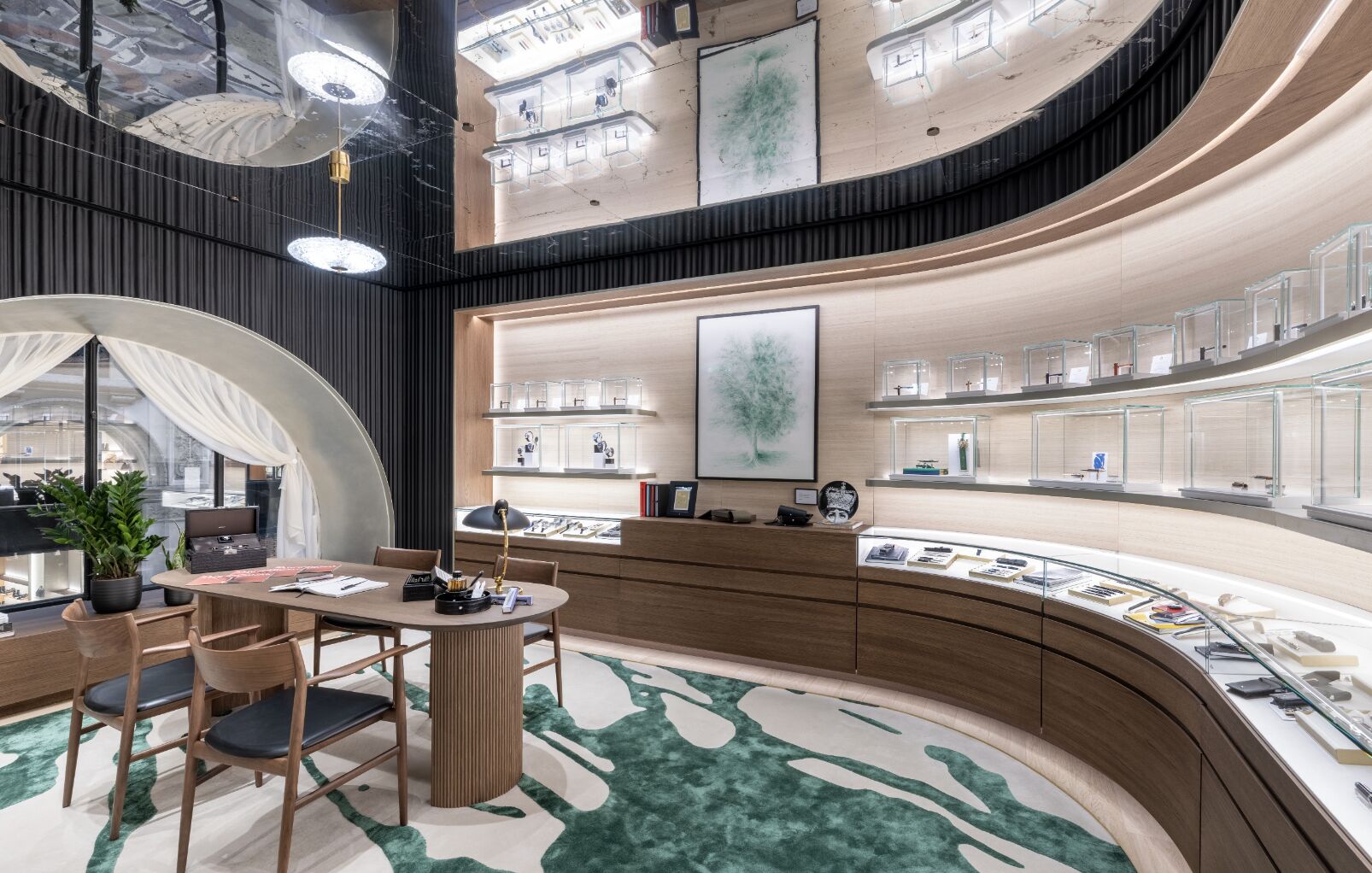 Curved product displays and patterned floor at Montblanc Milan