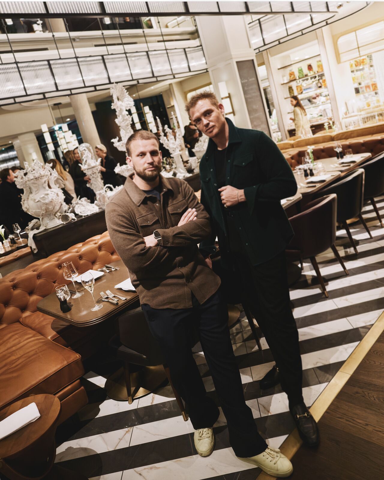 Two guests at the Mytheresa dinner at Rosewood Munich