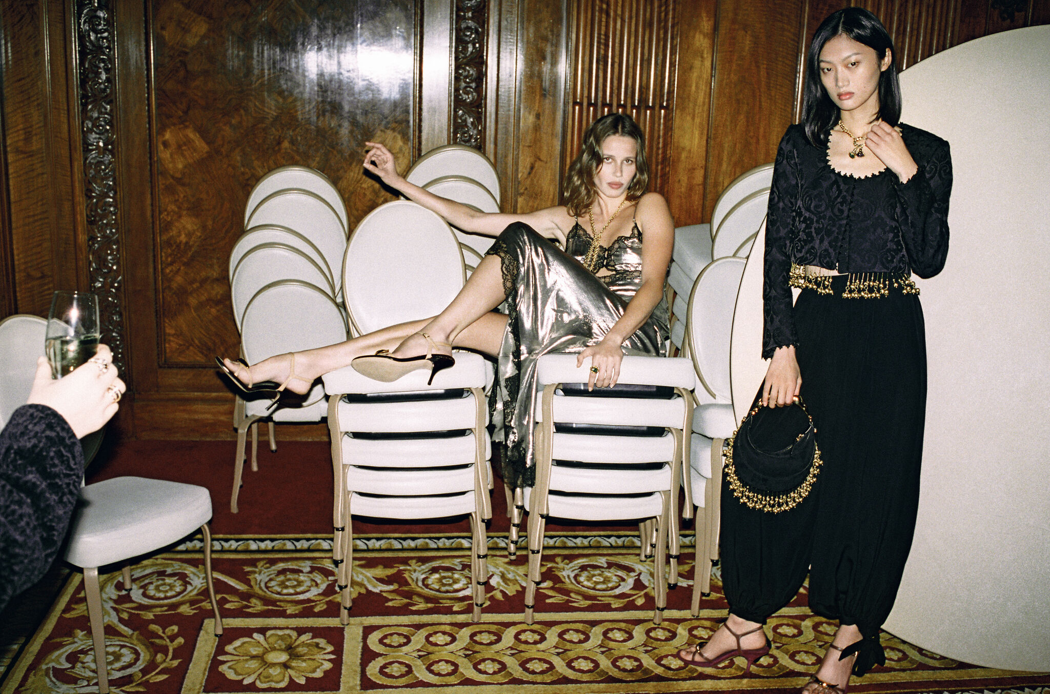 NET-A-PORTER holiday eveningwear campaign in a furnished interior