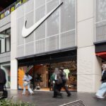 Nike Melbourne Central storefront with a large Nike Swoosh above the entrance.