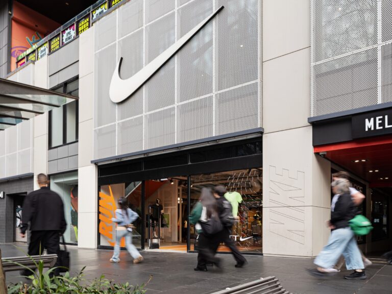 Nike Melbourne Central storefront with a large Nike Swoosh above the entrance.