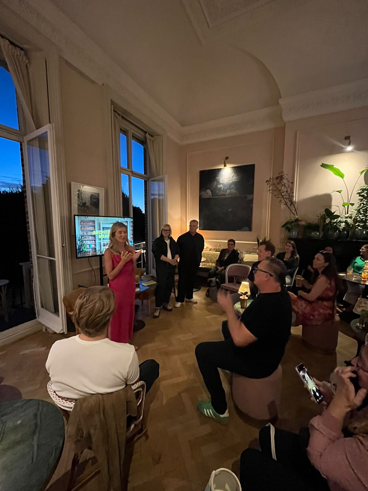 Guests gathered for a presentation about The Architecture of Meaning