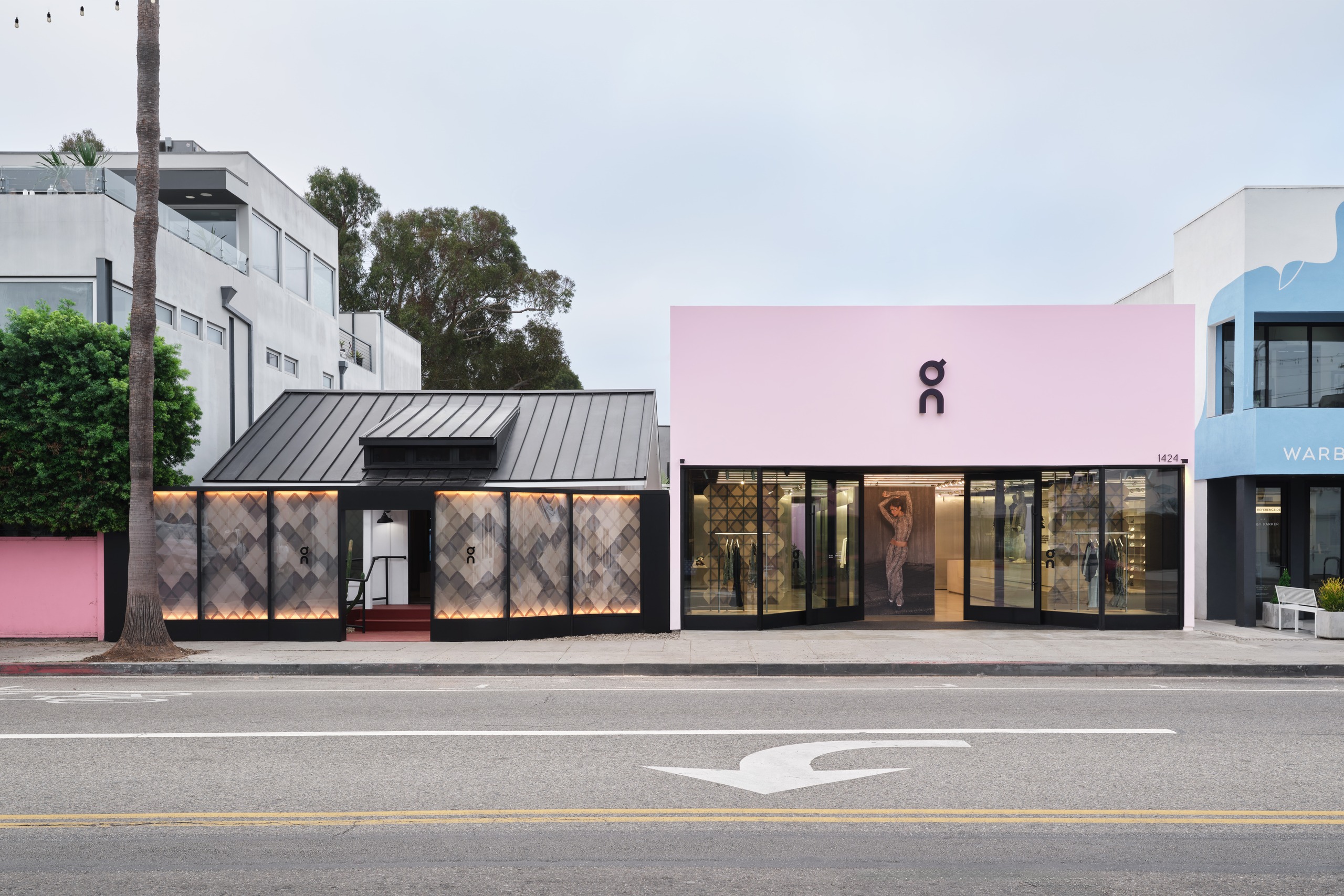 On Abbot Kinney exterior with pink frontage and python-print windows