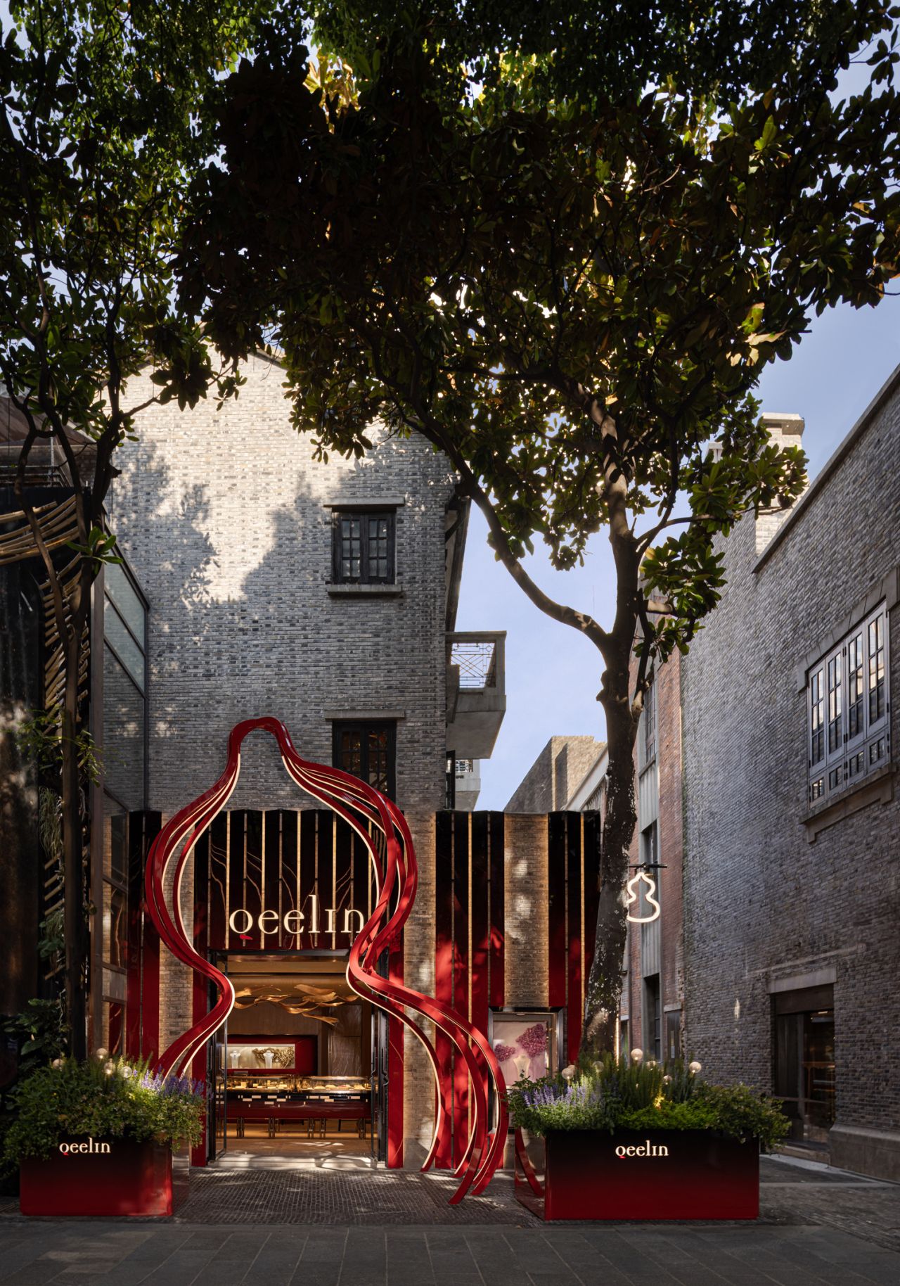 Qeelin House Shanghai Xintiandi entrance framed by a red Wulu-inspired installation