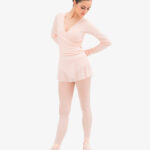 Repetto pink wrap top styled with a short pink skirt and ballet-inspired legwear