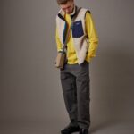 Maplestore outfit combining a Patagonia fleece vest, Gramicci cargo pants and Salomon trail-style shoes